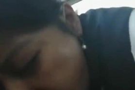 Asian girl sucks cock and swallows cum in a parked car