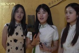 Three girls bound singing