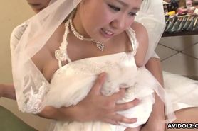 Japanese girl in a wedding dress Emi Koizumi takes a rough cock in her mouth uncensored.