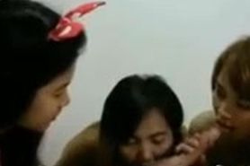 Three Asian sluts enjoy a single dick