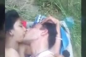 indian girl with husband for honeymoon after love marriage in field