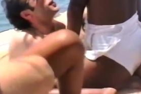 Black slut gets banged by white schlong on beach