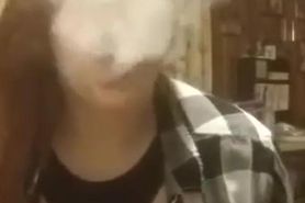 redhead smokes boobs out