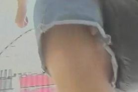 Splendid upskirt view of a chick at the mall
