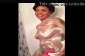 It is about curvy black chick taking a hot shower rubbing her pussy with finger and soap, so sexy.