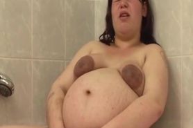 Preggo shower lesbos enjoy rough orgasms in the shower