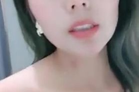 Asian girl tease and masturbate