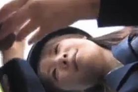 Asian police person Momo gives arousing blowjob in public