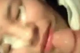 Chubby sweet Asian girl getting a massive facial in closeup