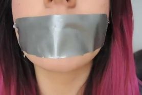 Woman tape gagged
