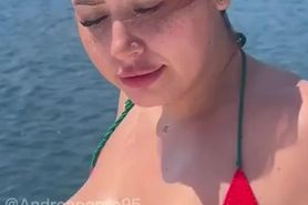 Latina curvy in red bikini fingering her pussy