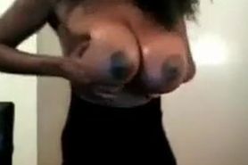 Ebony Slut With Large Breasts