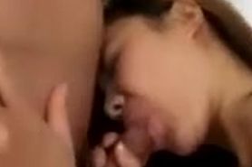 Slutty Asian MILF gets on her knees and gives an awesome BJ!