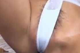 Horny Misora strips and fucks her hairy pussy with a cucumber
