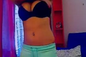 Hot brunette with hot boobs stripteasing on webcam