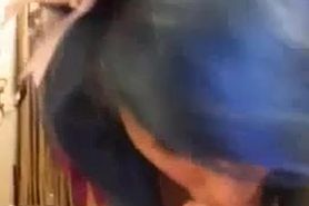 Sexy blue haired girl sucks dildo
