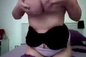 Buxom chick shakes her gigantic boobies on webcam