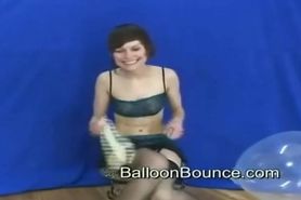 Girl Bouncing on a Balloon