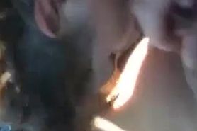 Brunette sucking cock in the car
