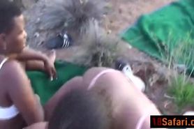 Two African chicks screw white tourist during safari in desert
