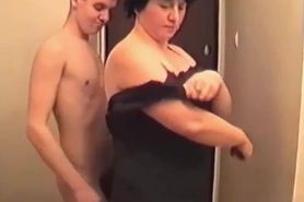 Russian mature mother Liza fucked with a student in the hallway