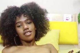Curly Ebony with perfect natural tits and hairy pussy fucks a huge white dildo