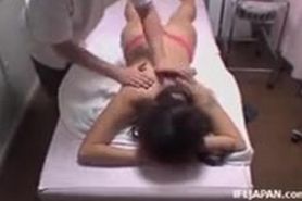 Booty Japanese girl gets fingered by a skillful masseur
