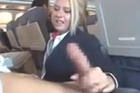 Handjob in airplane with sexy stewerdess