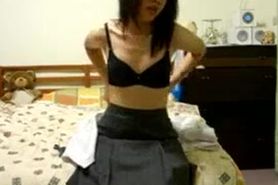 Taiwanese girl gets naked and masturbates on camera