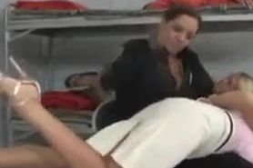 Blonde spanked by policewoman