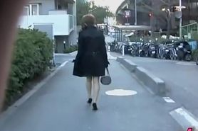 Business lady with a juicy ass skirt sharked on the street