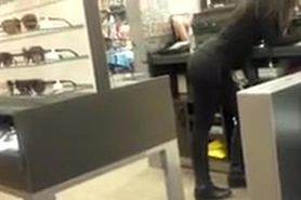 Brunette Latina getting filmed while working in leggings