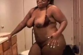 Big beautiful busty black BBW fucks her fat juicy pussy.flv