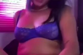 Latina in blue lingerie masturbates with a dildo