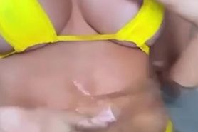 Latina in yellow bikini masturbates at the tube hot