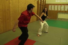 Karate girl beats man