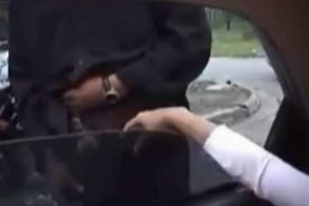 Handjob in the car, in the middle of the street