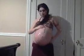 Pregnant Whore Strips Down