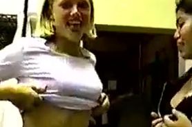 Blonde cutie showing her boobs