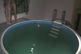 Handjob and sex with petite brunette in the pool