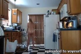 Nudist girl clean the kitchen