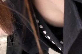 Nice down blouse of a cute asian girl wearing black bra