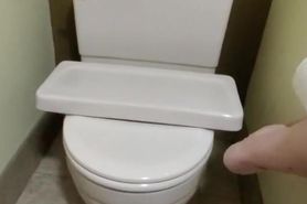Trying to piss in the back of the toilet. Made a huge mess
