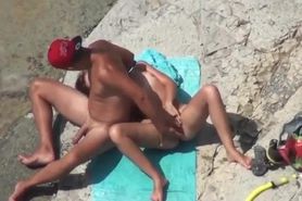 Beach couple sex play