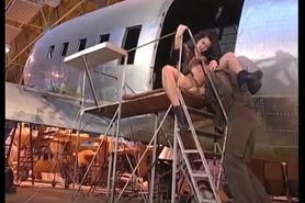 Hungary Girl Takes On Big Airplane Repairman