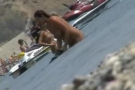 lots of very sexy naked babes on the nudist beach getting wet