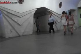 Two outstanding girlfriends' upskirt by the voyeur