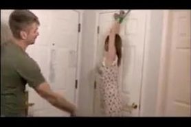 Guy punishing his wife for drinking