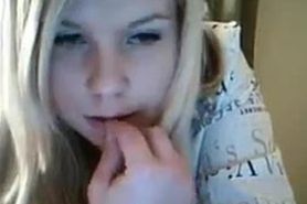 Sexy blonde plays with her boobs on cam