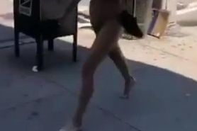 Public nude woman in street